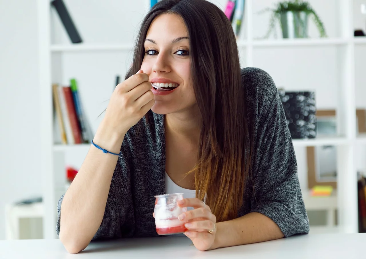 Woman eating dairy
