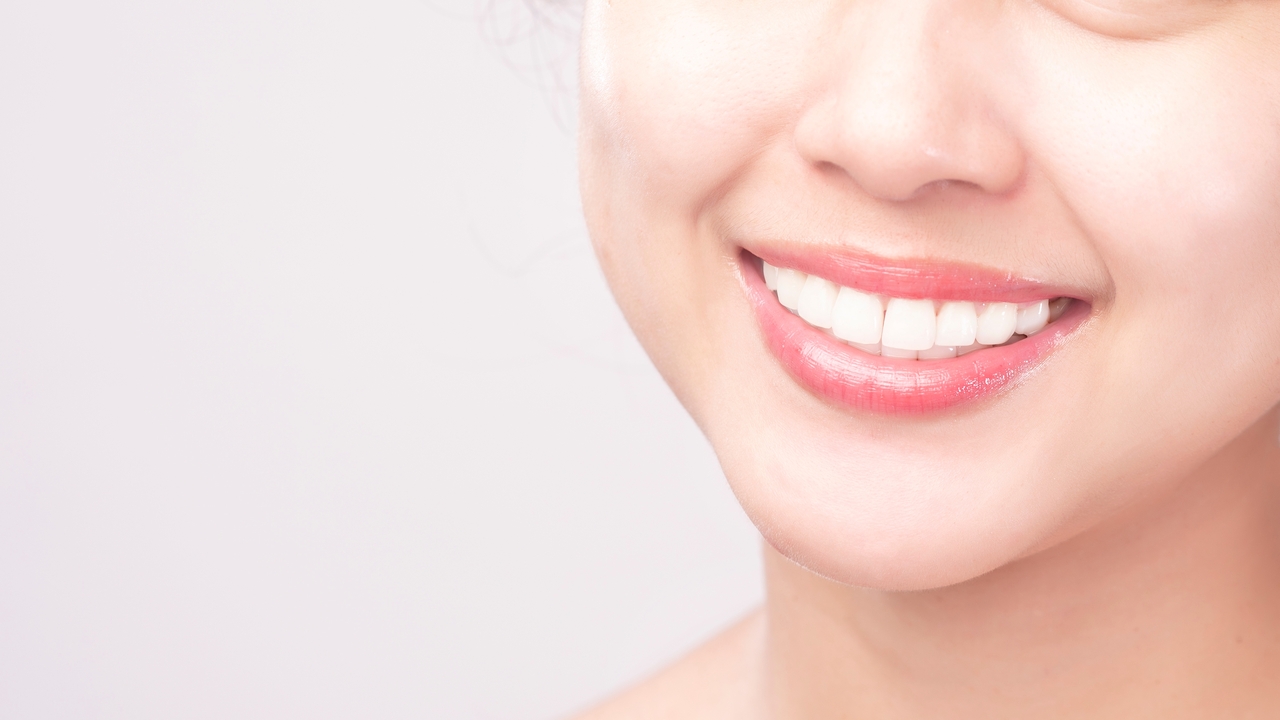 White teeth due to proper oral care for adults